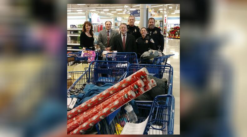 Last year, Fairfield police officers and employees shopped at Meijer on South Gilmore Drive for Dougie & Ray’s Shop with a Hero program to help children within the Fairfield Schools. This year, Dougie & Ray’s have included the Fairfield city and township police departments, school district, and local business leaders. The charity and Meijer are donating money to for the local heroes to shop for needy children who likely weren’t going to receive any presents this Christmas. FILE