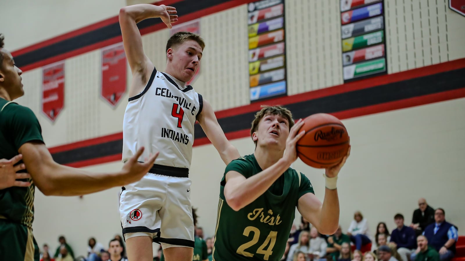 Catholic Central senior Keegan Guenther prepares to shoot the ball as Cedarville's Will Mossing leaps to block his shot during their game on Friday, Jan. 9 in Cedarville. CONTRIBUTED PHOTO
