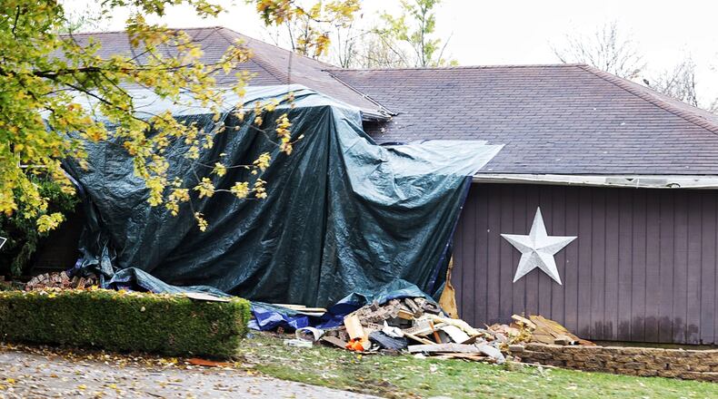 An SUV crashed into a home in the 5300 block of Hamilton Mason Road on Oct. 30, 2022. NICK GRAHAM/STAFF