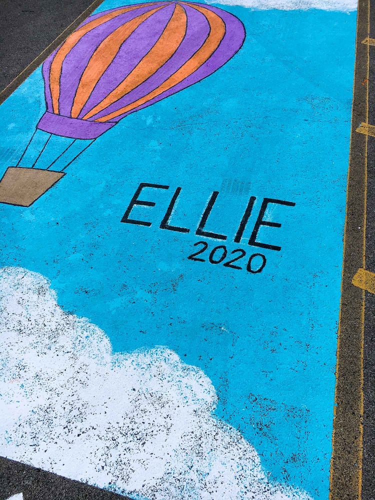 PHOTOS Lakota East seniors paint parking spots