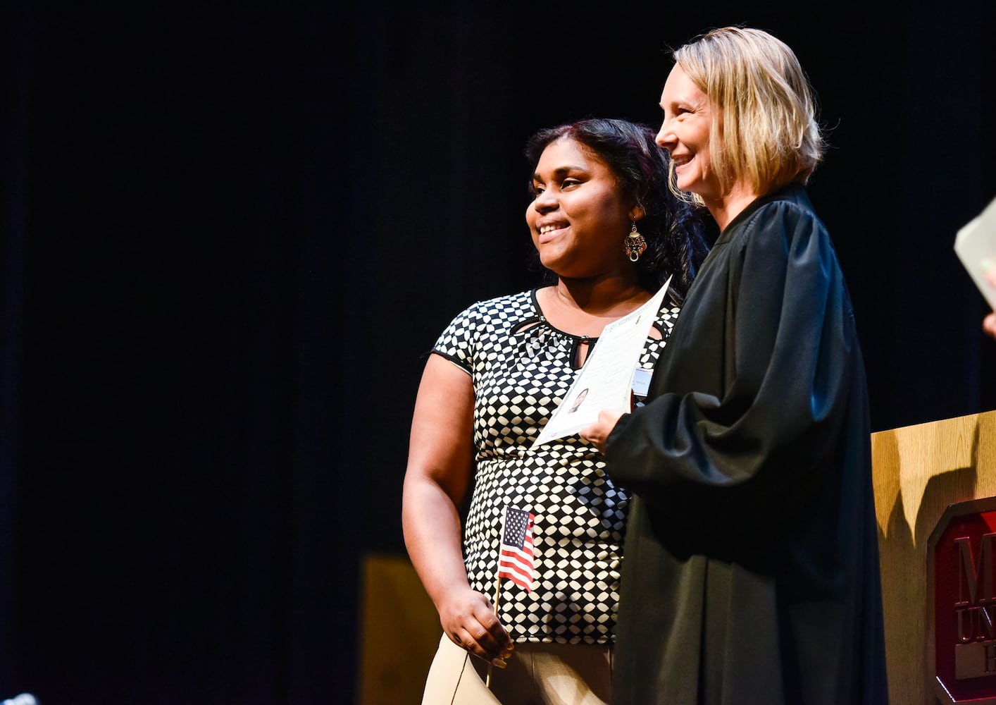 Nearly 100 people become U.S. citizens at naturalization ceremony at Miami Hamilton