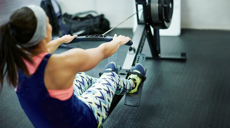 Be sure to move in a slow and controlled manner when rowing for exercise rather than using excessive weight and momentum. iSTOCK