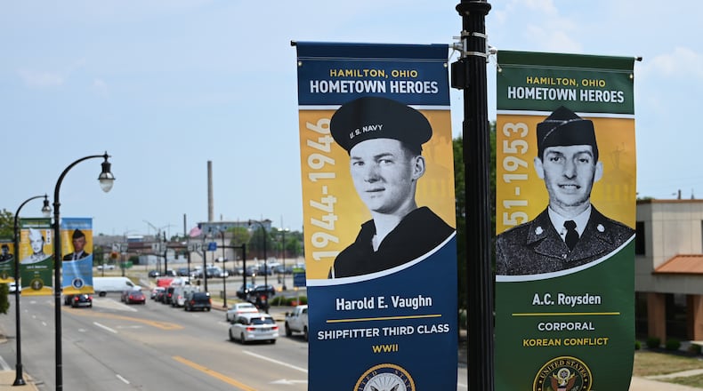 Pictured are the Hamilton Hometown Hero banners of Navy Shipfitter 3rd Class Harold E. Vaught and Army Cpl. A.C. Roysden. They are two of the more than 350 banners of men and women who served in the armed forces and either had or currently live in Hamilton. Banner applications for 2025 will open from Veterans Day, Nov. 11, 2024, through Feb. 28, 2025. MICHAEL D. PITMAN/STAFF