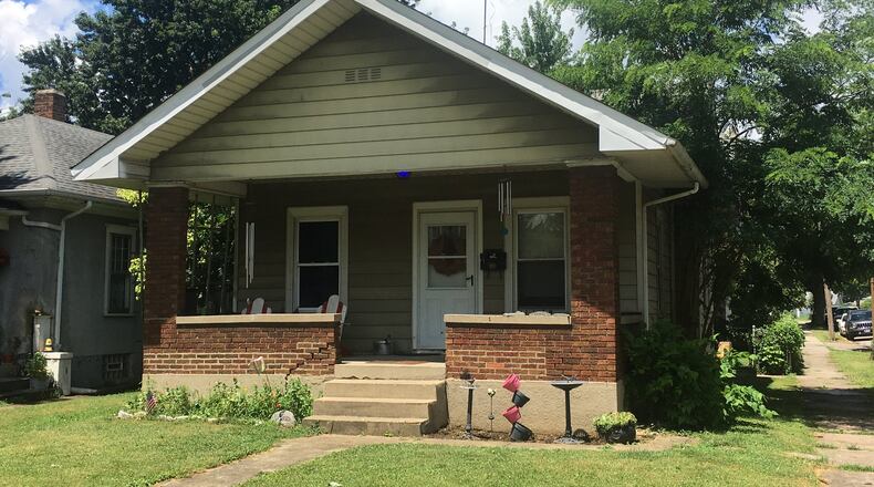 This Middletown home in the 2200 block of Tytus Avenue allegedly was the site of an armed burglary Tuesday afternoon when juveniles entered the home and stole guns and jewelry, according to Middletown police. RICK McCRABB/STAFF