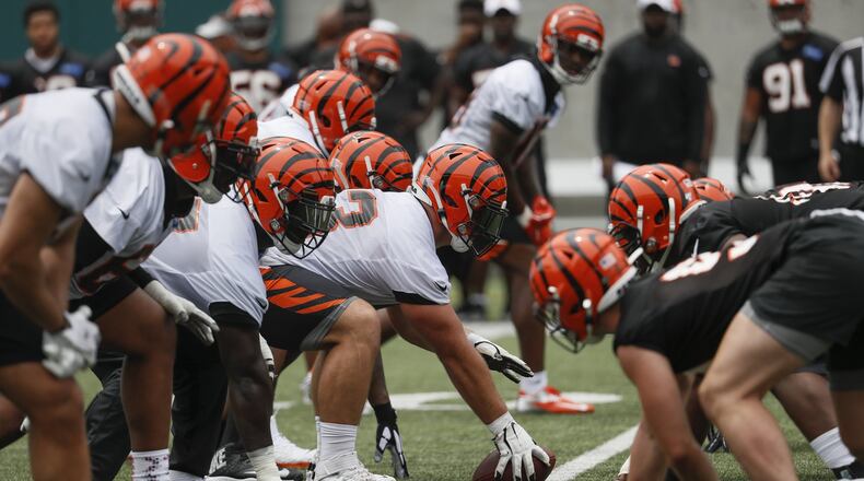 Cincinnati Bengals center Billy Price, center, lines up a play during practice at the team’s NFL football facility, Wednesday, June 12, 2019, in Cincinnati. (AP Photo/John Minchillo)