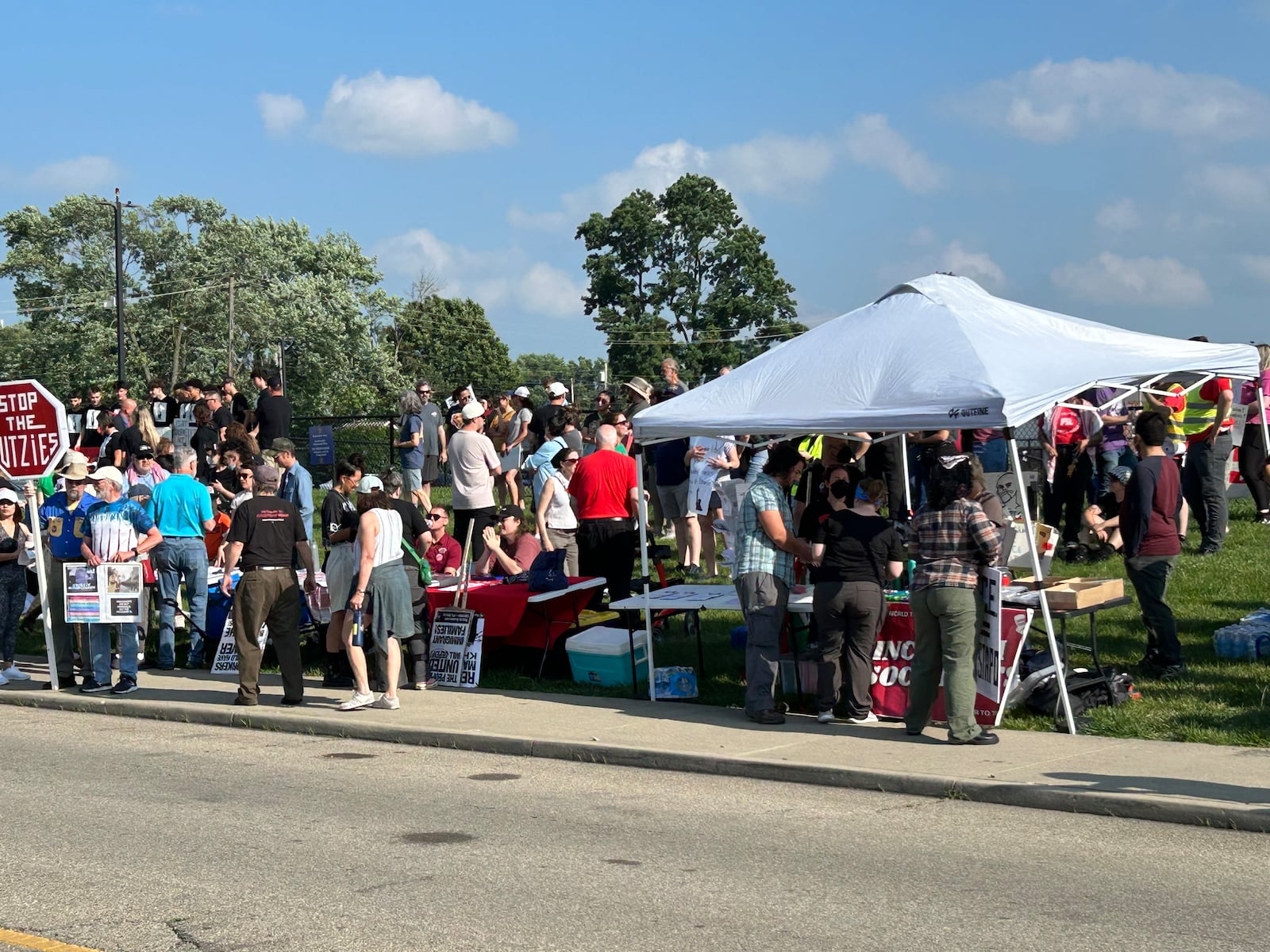 About 100 protestors attended a rally Sunday night outside the Butler County Jail in Hamilton. They want a 19-year-old Western Hills High School graduate released from jail after he was arrested by ICE officials. RICK McCRABB/CONTRIBUTOR