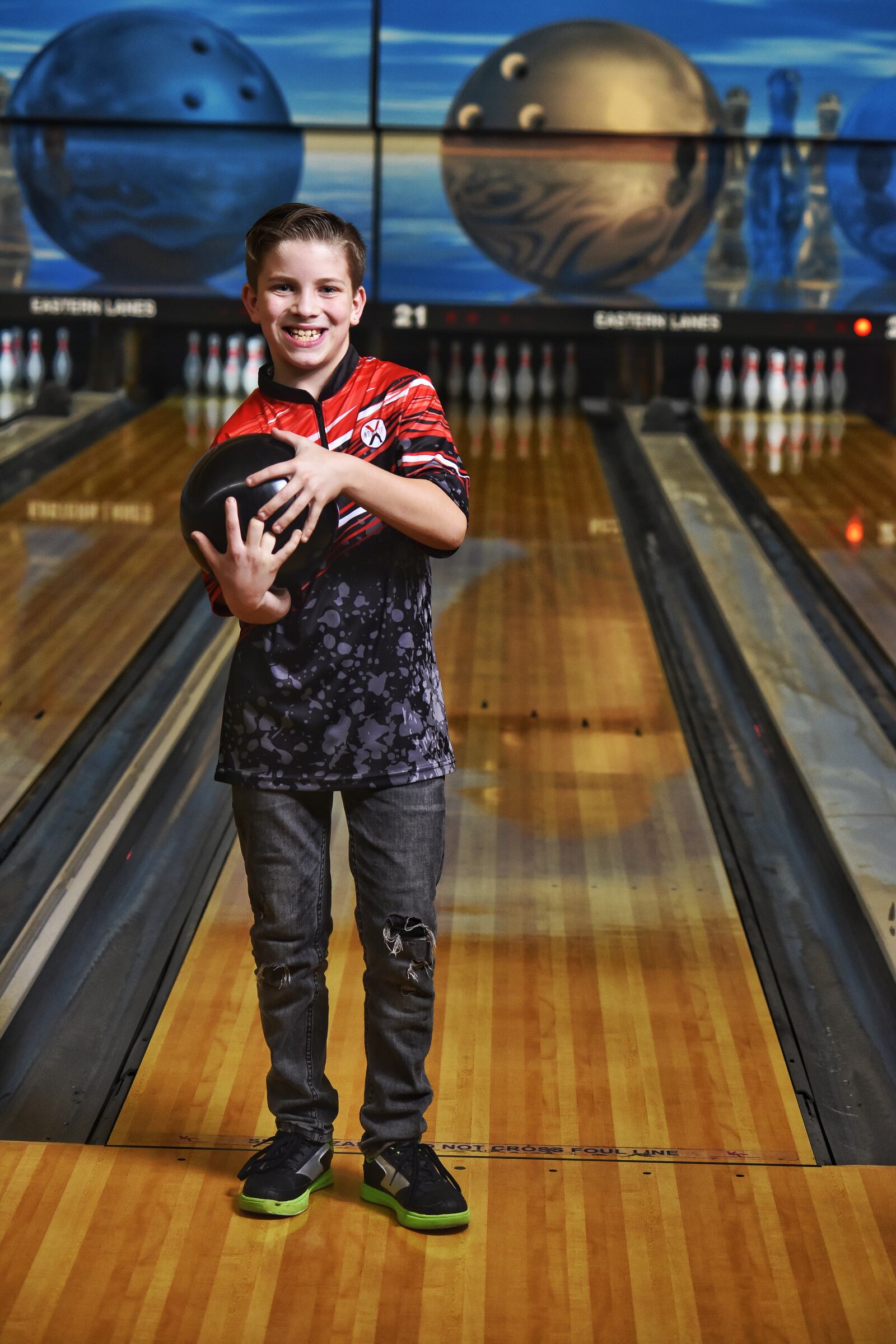 Greyson Garland, 11, bowled a perfect 300 game Dec. 5 at Eastern Lanes in Middletown. He became the 13th youngest to bowl a perfect game. NICK GRAHAM / STAFF