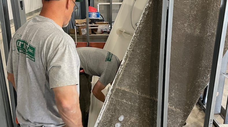 Plumbers with Korrect Inc. work on a bathroom fixture. Stretches of below-freezing temperatures result in increased calls for service to plumbing and heating professionals. CONTRIBUTED