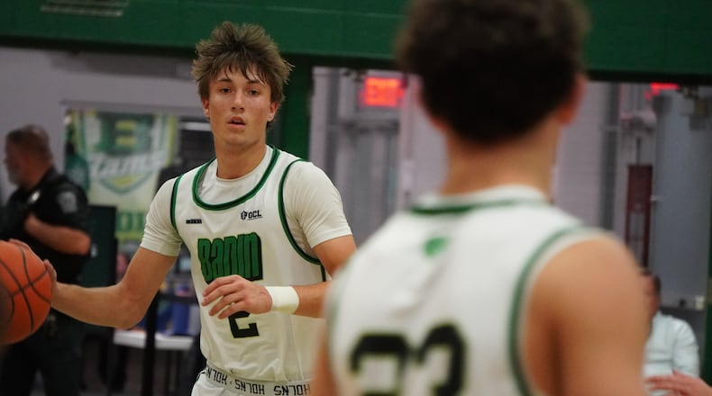 Badin’s Carson Lowe is eyes the court during his game against Alter on Friday night at Mulcahey Gym. CHRIS VOGT / CONTRIBUTED