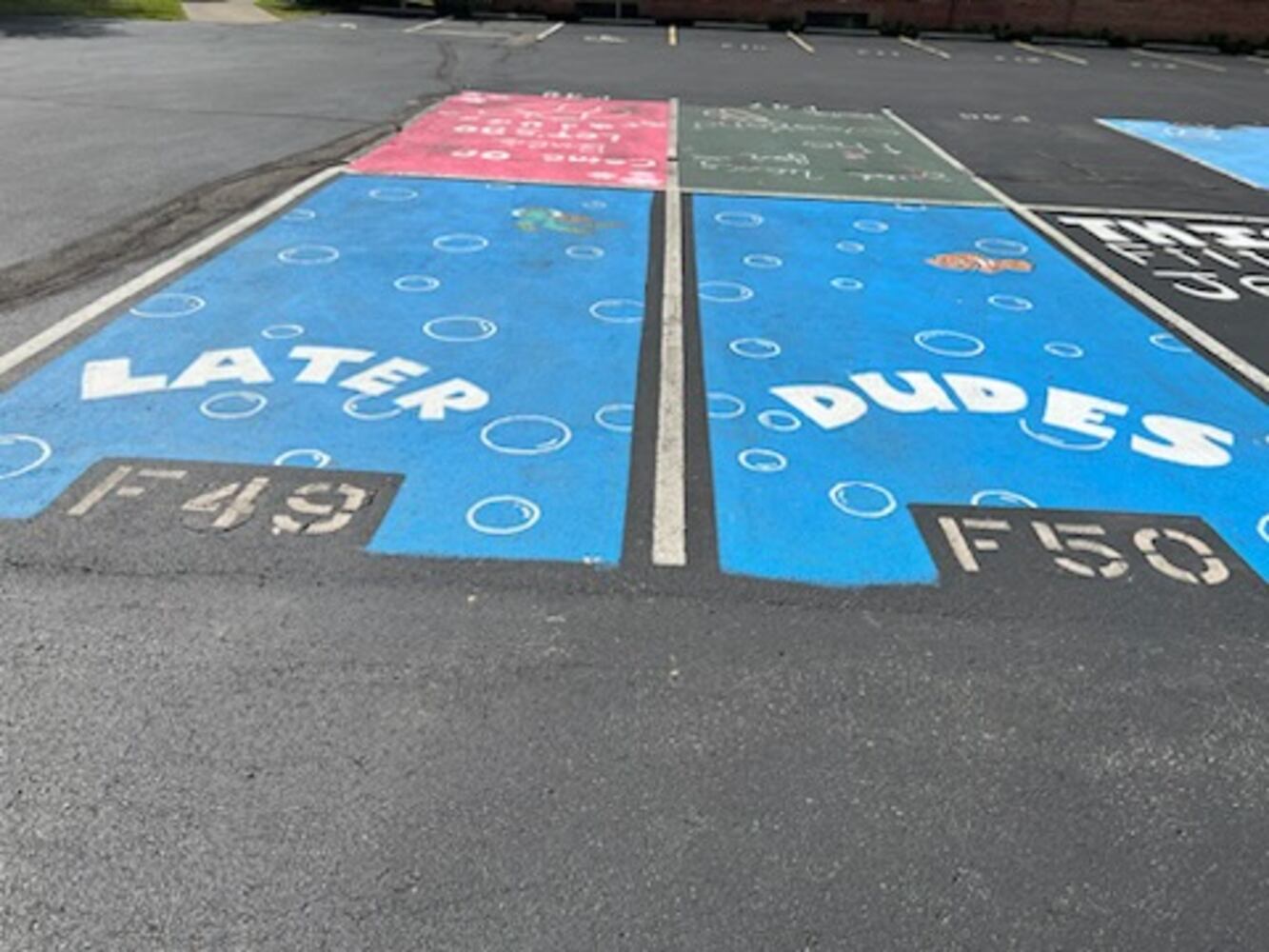Hamilton High School parking lot spaces