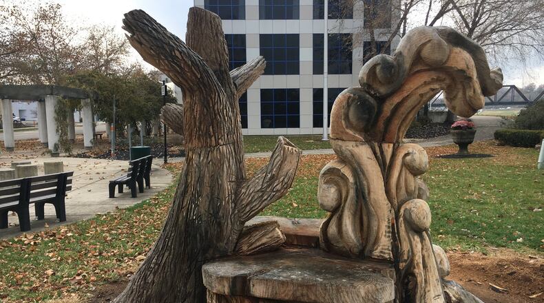 A bench has been made from a beloved tree near the Soldiers, Sailors and Pioneers monument in Hamilton. The bench features waves, representing the Great Miami River, and a tree, representing the tree that had to be chopped down because it posed a safety risk.