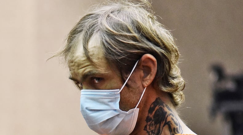 This March 8, 2021 photo shows James Hamilton during a Bond hearing in Butler County Common Pleas Court in Hamilton, Ohio. Hamilton is charged with multiple counts in connection to the disposal of the body of his girlfriend's 6-year-old son James Hutchinson. (Nick Graham/Dayton Daily News via AP)