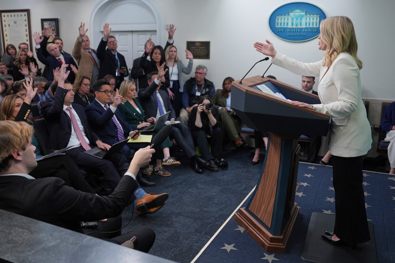 White House press secretary Karoline Leavitt speaks with reporters in the James Brady Press Briefing Room at the White House, Tuesday, April 8, 2025, in Washington. (AP Photo/Evan Vucci)