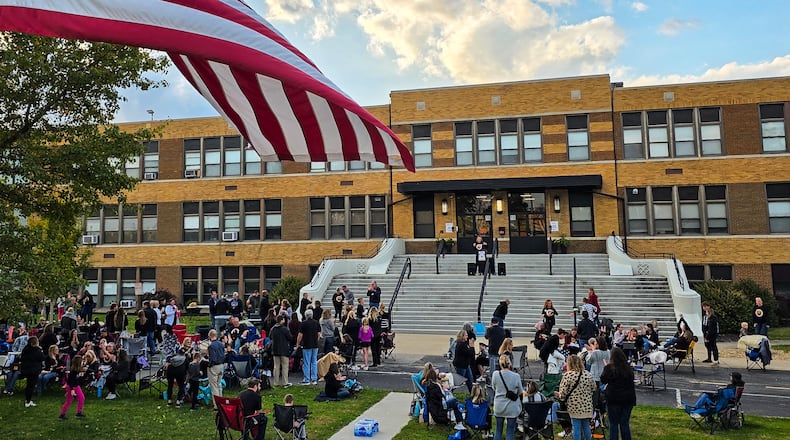 Over 100 Ross Local Schools teachers gather for a rally Wednesday, Nov. 5 while contract mediation talks are going on inside the Ross Local Schools Administrative Offices. NICK GRAHAM/STAFF