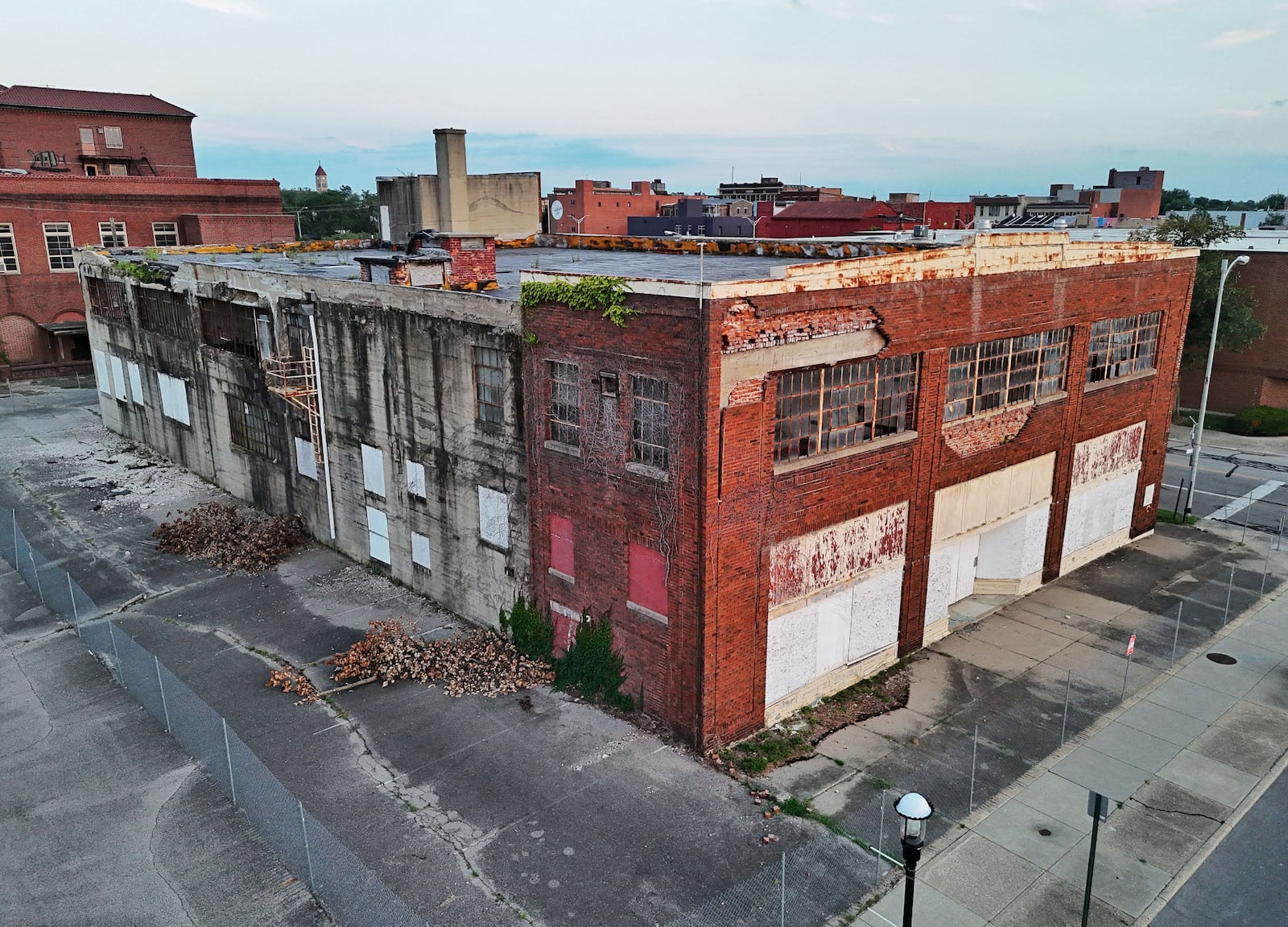 Middletown is asking residents for their opinion on the fate of two downtown buildings, the Manchester Inn and the Sonshine building. NICK GRAHAM/STAFF