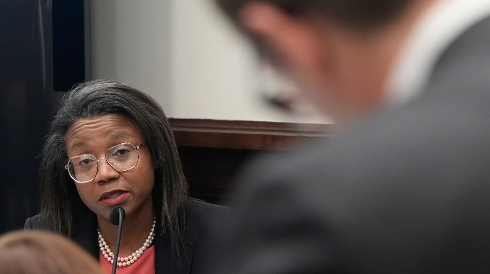 Former FirstEnergy Chief Ethics Officer Ebony Yeboah-Amankwah, a witness called by the state, testifies under cross examination in the trial of ex-FirstEnergy Senior Vice President Michael Dowling and former FirstEnergy CEO Chuck Jones in Summit County Court of Common Pleas Judge Susan Baker Ross's courtroom in Akron, Ohio, on Tuesday, Feb. 17, 2026. (Mike Cardew/Akron Beacon Journal via AP, Pool)