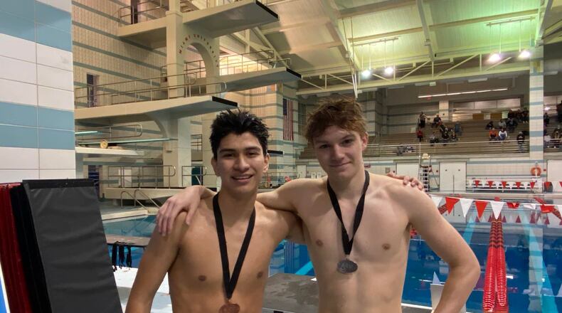 Junior Jonah Femiani, left, finished third in the boys’ 100-yard breaststroke at the league meet while sophomore Stephen Mullally was second in the event. CONTRIBUTED