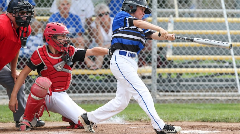 Hamilton West Side’s Nick Brosius takes a cut against Canfield during the state tournament in Maumee. Brosius and Clint Moak are the two 11-year-olds who are part of Hamilton’s 12-year-old all-star squad. CONTRIBUTED PHOTO BY SCOTT GRAU