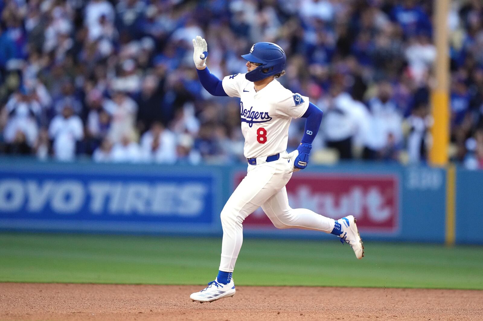 Los Angeles Dodgers' Kiké Hernández gestures as he heads to second after hitting a solo home run during the fourth inning of a baseball game against the Los Angeles Angels, Saturday, May 17, 2025, in Los Angeles. (AP Photo/Mark J. Terrill)