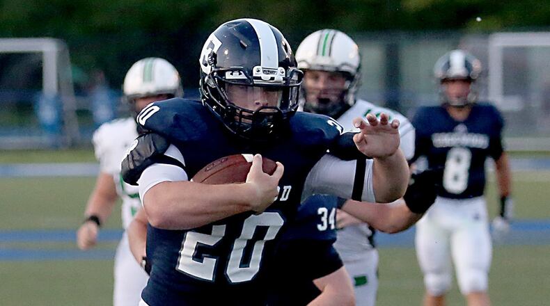 Edgewood fullback Carroll Moore beats Badin into the end zone for a touchdown during their game at Kumler Field in Trenton on Sept. 9. CONTRIBUTED PHOTO BY E.L. HUBBARD