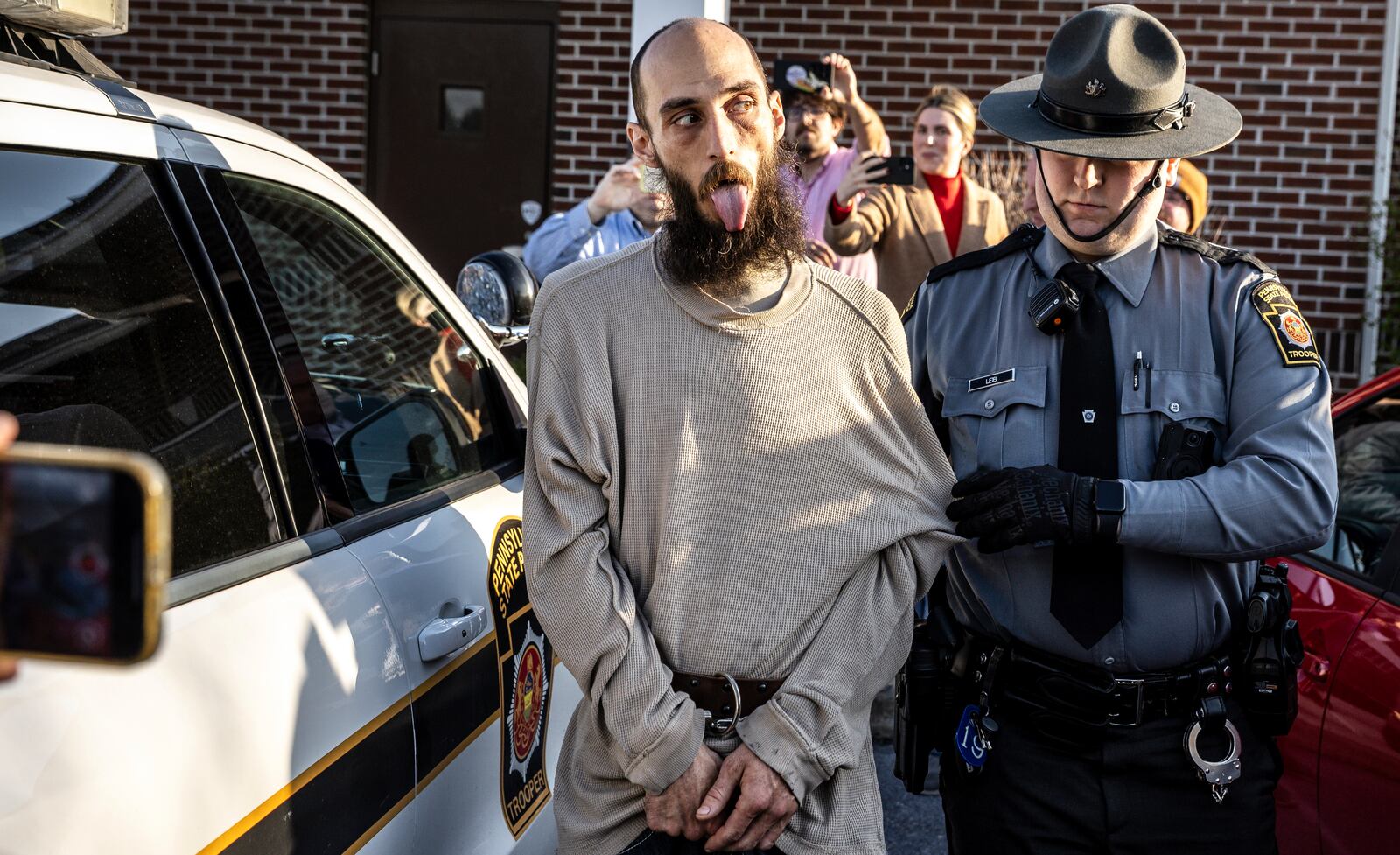 Cody Balmer is escorted from court after his arraignment Monday, April 14, 2025, in Harrisburg, Pa. (Dan Gleiter/The Patriot-News via AP)