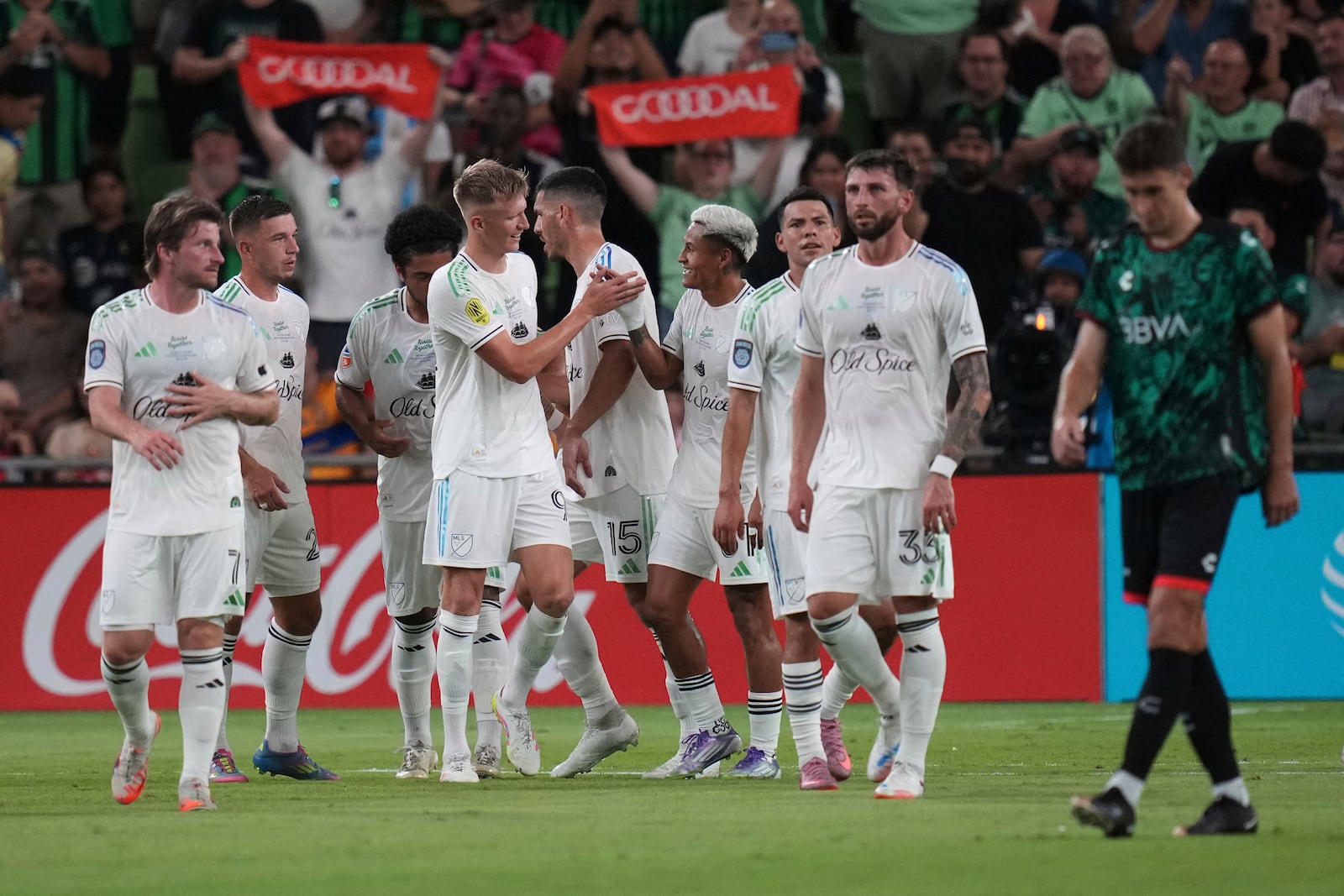 MLS All-Stars' Sam Surridge, center, celebrates with teammates after his goal against Liga MX All-Stars during the MLS All-Star soccer match in Austin, Texas, Wednesday, July 23, 2025. (AP Photo/Eric Gay)