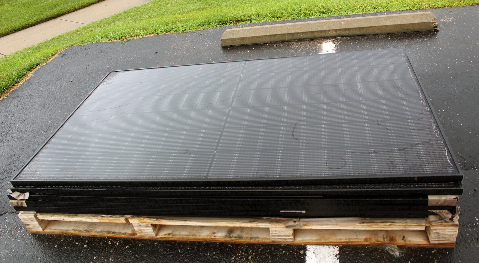 Melink Solar designed and installed 168 solar panels, each weighing between 40-50 pounds, on the rooftop of the West Chester Twp. administration building. SUE KIESEWETTER/CONTRIBUTED