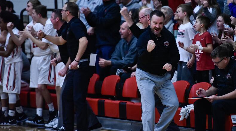 Franklin coach Brian Bales reacts to a positive play for his team during Friday night’s game against Valley View at Darrell Hedric Gym in Franklin. NICK GRAHAM/STAFF