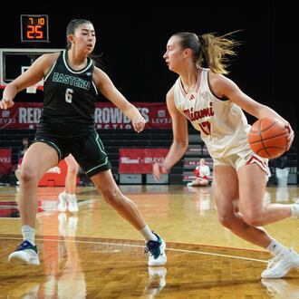 Miami’s Núria Jurjo dribbles into the lane against Eastern Michigan on Wednesday night at Millett Hall. CHRIS VOGT / CONTRIBUTED