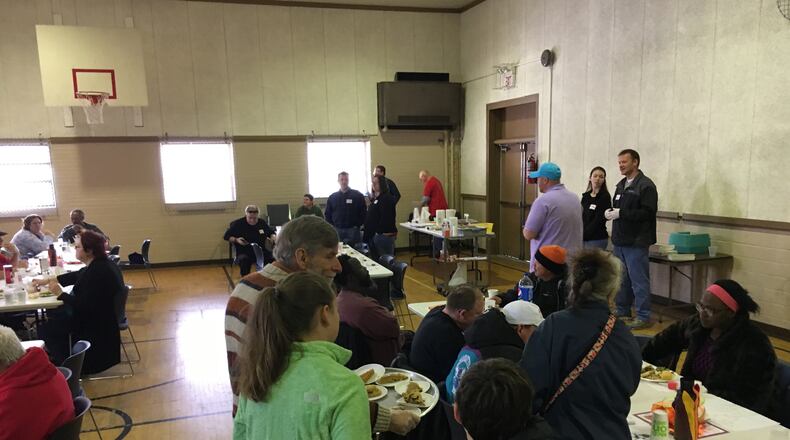 More than 300 meals were served Thursday during a community Thanksgiving dinner at Zion Evangelical Lutheran Church in Hamilton. ED RICHTER/STAFF
