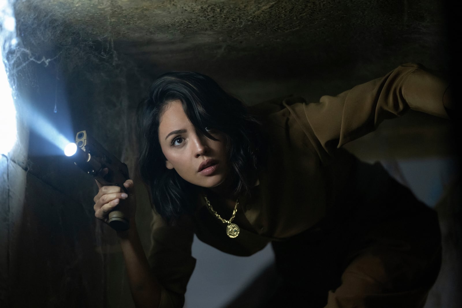 This image released by Apple TV+ shows Eiza Gonzalez in a scene from the film "Fountain of Youth." (Apple TV+ via AP)