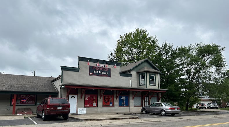 Middletown police say two people were shot Monday morning in the parking lot of J-Rocks Bar, 3008 Tytus Ave. The bar was open Monday morning, eight hours after the shooting. RICK McCRABB/STAFF