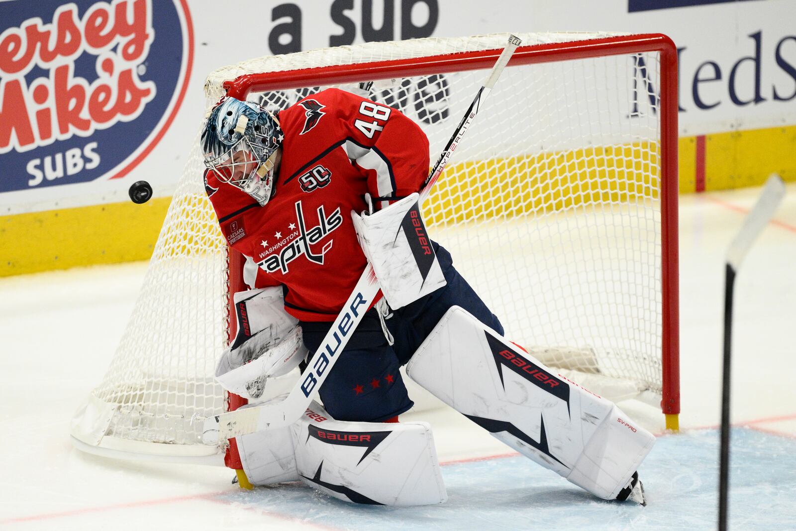 Washington Capitals goaltender Logan Thompson deflects the puck in the third period of Game 1 of a first-round NHL hockey playoff series against the Montreal Canadiens, Monday, April 21, 2025, in Washington. (AP Photo/Nick Wass)