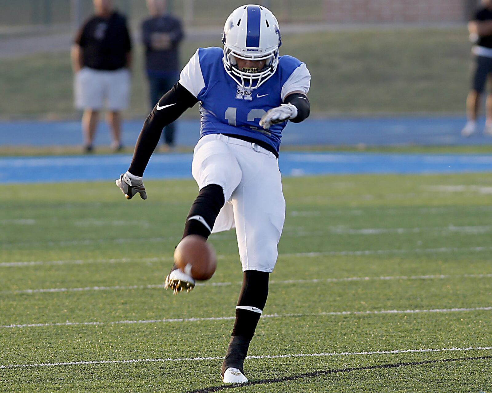 Hamilton’s David Cunningham punts the ball to Moeller during Saturday night’s Skyline Chili Crosstown Showdown matchup at Virgil Schwarm Stadium in Hamilton. CONTRIBUTED PHOTO BY E.L. HUBBARD