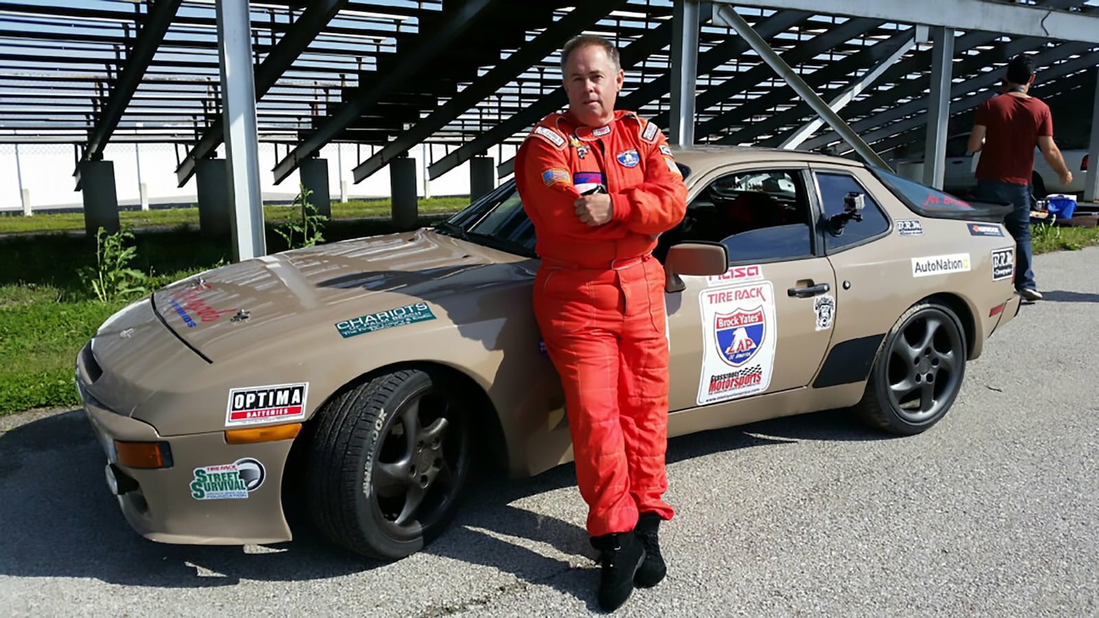 Joe Browne loved "anything with a motor." He is shown with a custom race car that he designed and built himself. CONTRIBUTED