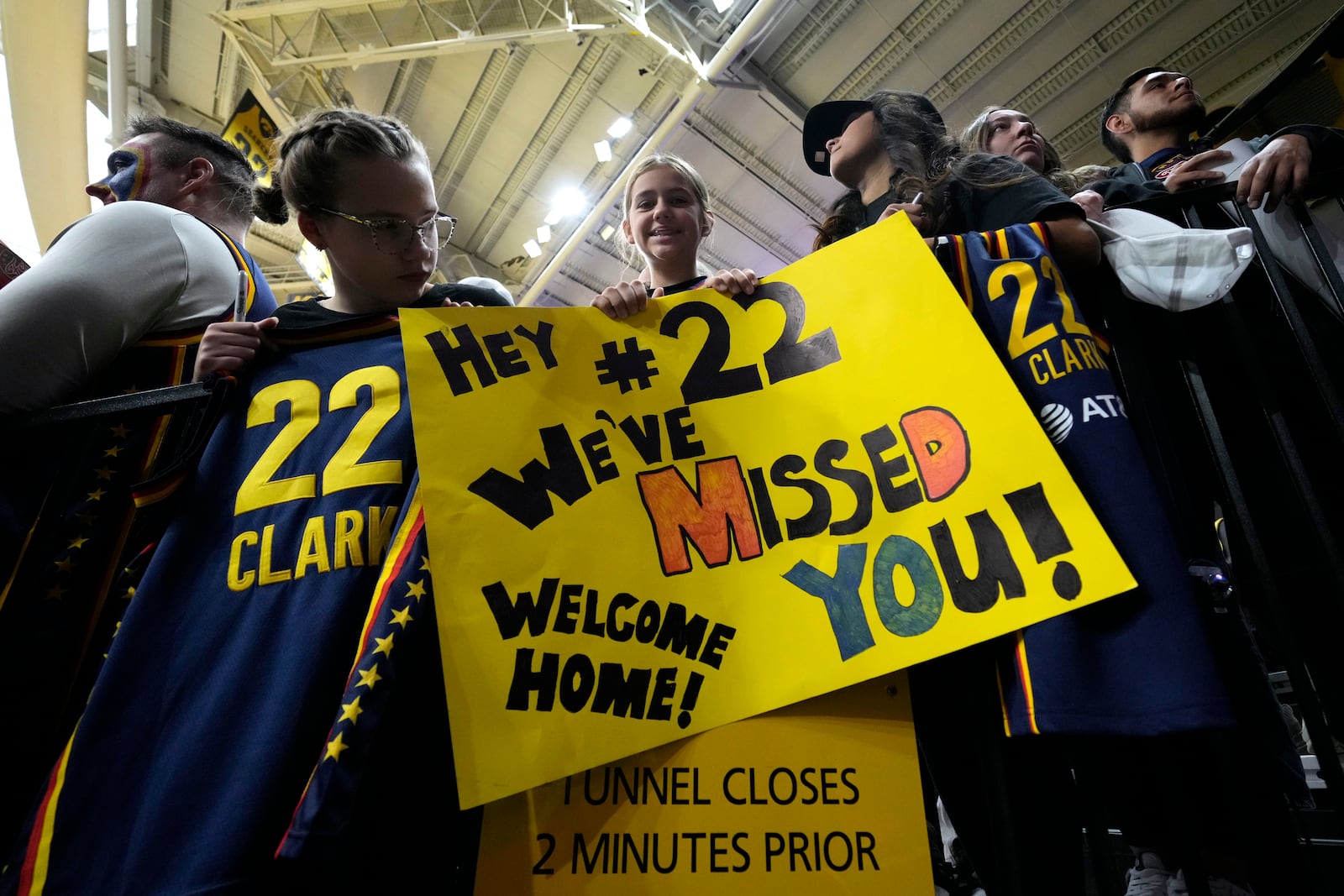 Fans watch Indiana Fever guard Caitlin Clark warm up before an exhibition women's basketball game against Brazil, Sunday, May 4, 2025, in Iowa City, Iowa. (AP Photo/Charlie Neibergall)