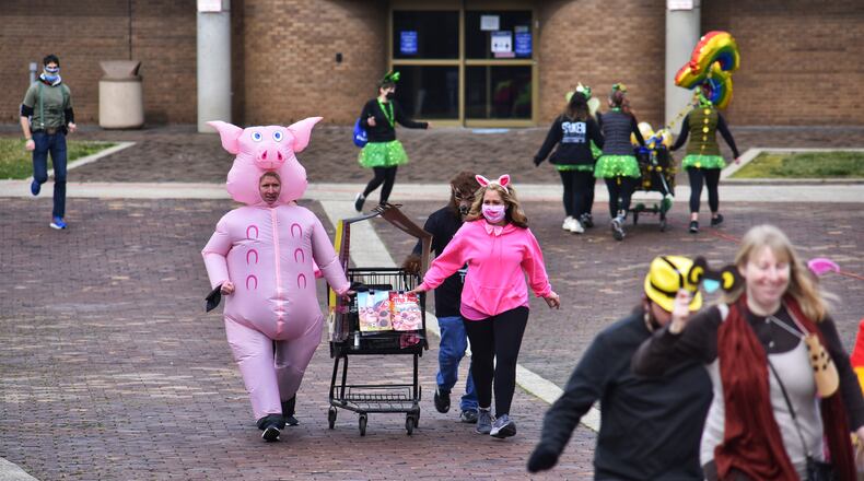 Teams participated in the Kiwanis Club of Middletown 2021 Book Around Middletown Shopping Cart Challenge Saturday, March 13, 2021. Challenges were set up for competitors at businesses throughout downtown. All proceeds went to Dolly Parton's Imagination Library. NICK GRAHAM / STAFF