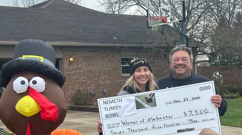 Trisha and Jay Nemeth hosted the third annual Nemeth Turkey Bowl on Thanksgiving at their Springboro home. That day, they raised $7,500 for Women of Alabaster, a faith-based organization that cares for victims of sexual trafficking and substance abuse by providing alternatives to street life. Since then, they have received about $2,500 more in donations. SUBMITTED PHOTO