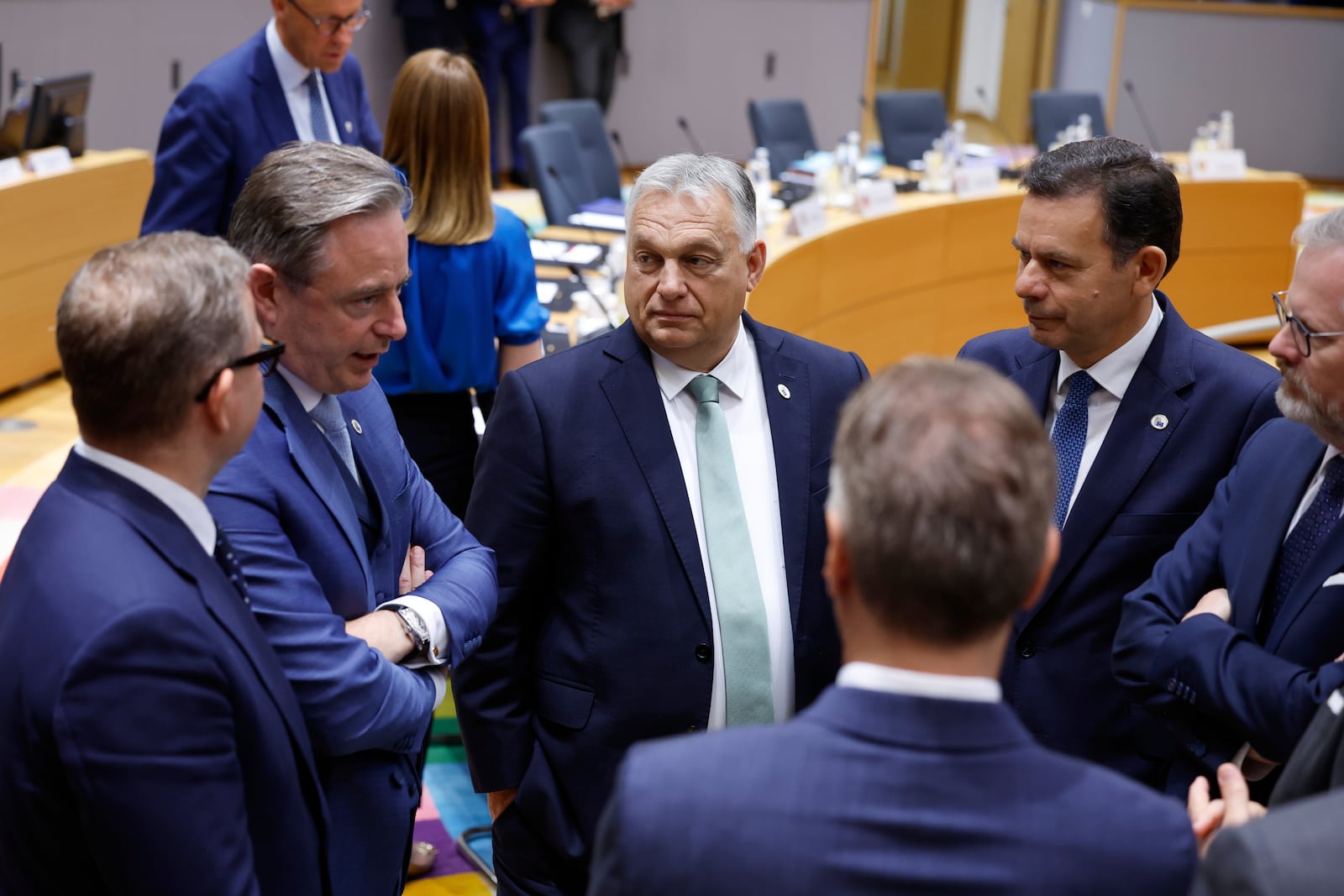Clockwise from left, Finland's Prime Minister Petteri Orpo, Belgium's Prime Minister Bart De Wever, Hungary's Prime Minister Viktor Orban, Portugal's Prime Minister Luis Montenegro, Czech Republic's Prime Minister Petr Fiala, and Slovenia's Prime Minister Robert Golob attend a round table meeting at an EU summit in Brussels, Thursday, June 26, 2025. (AP Photo/Geert Vanden Wijngaert)
