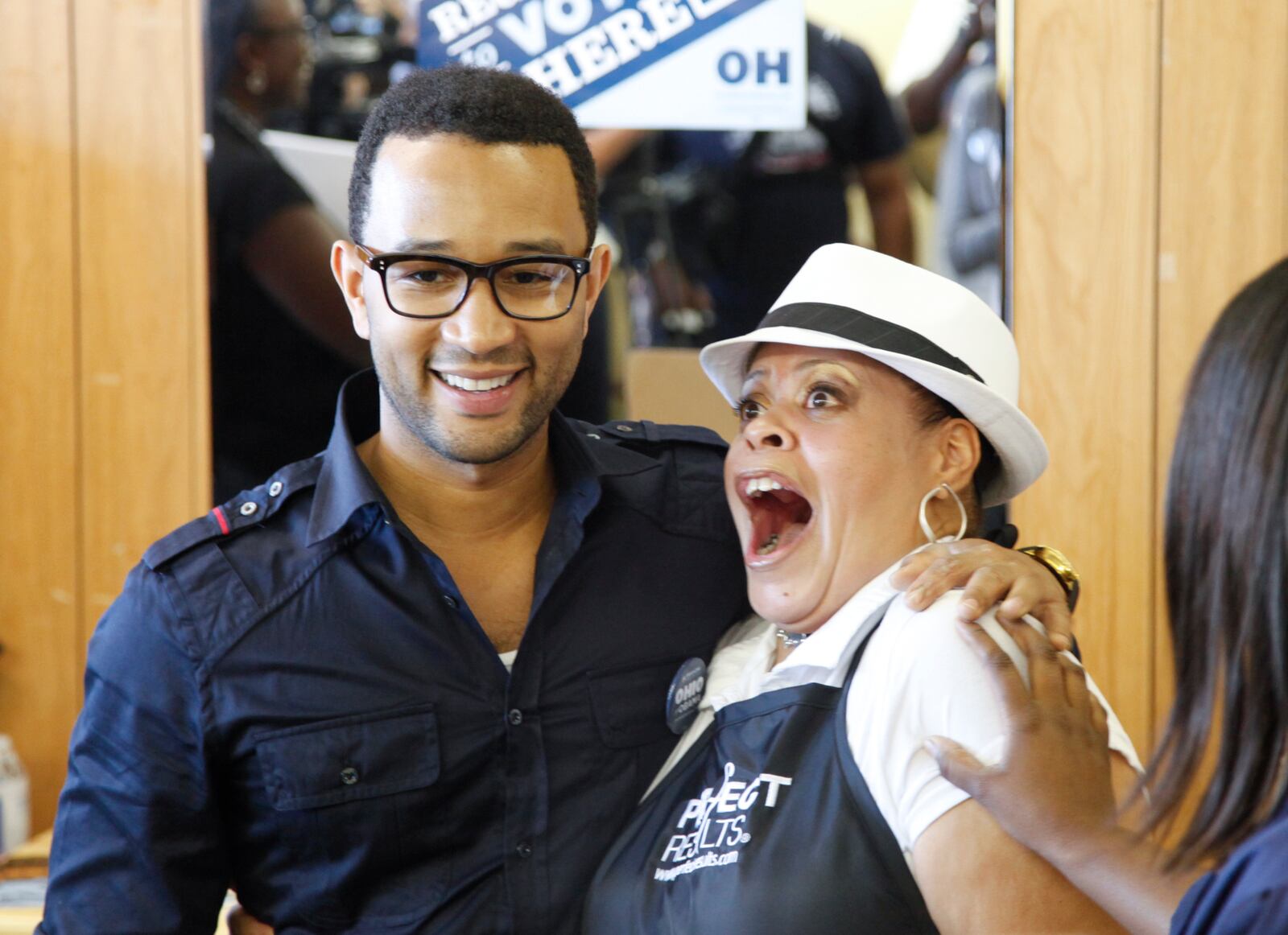 Grammy award winning singer John Legend made a stop at It's Tyme  Beauty Shop in Dayton and greets employees including Hope Hillsman, a stylist at the shop. Legend made the 2012 stop to encourage people to register to vote and to support President Barack Obama's re-election. LISA POWELL / STAFF
