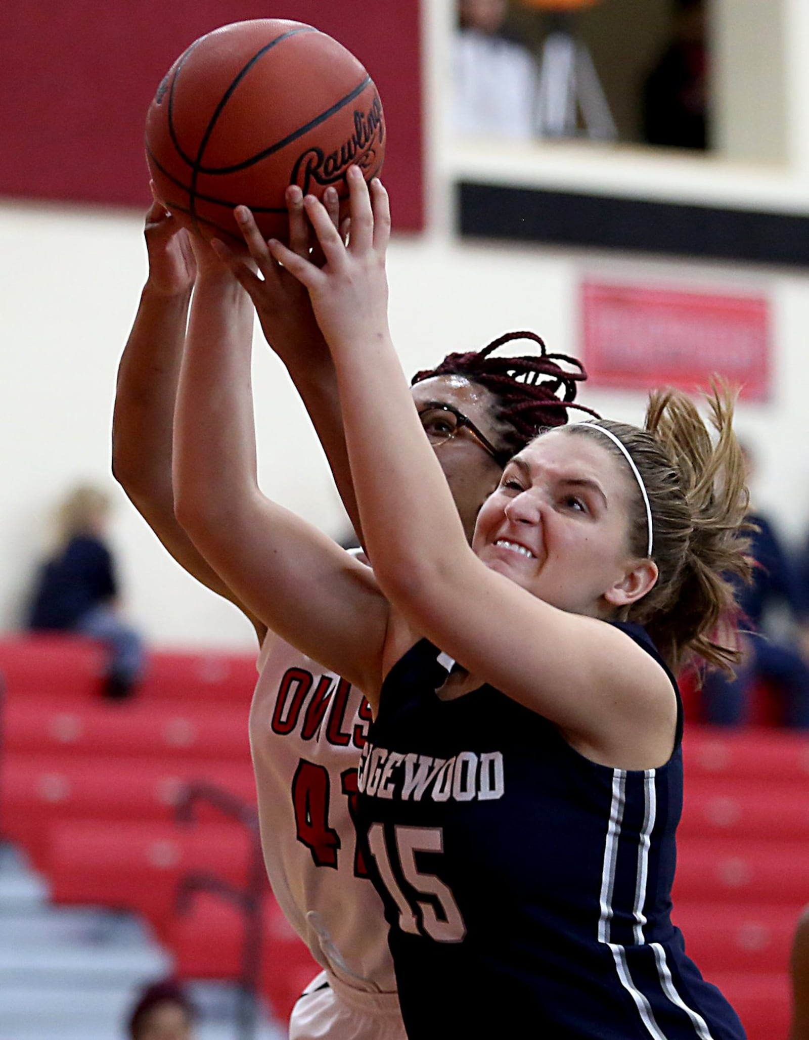 Edgewood forward Kayla Curtis (15) and Mt. Healthy’s Kohlbi Gover fight for the ball Saturday afternoon at Mt. Healthy. CONTRIBUTED PHOTO BY E.L. HUBBARD