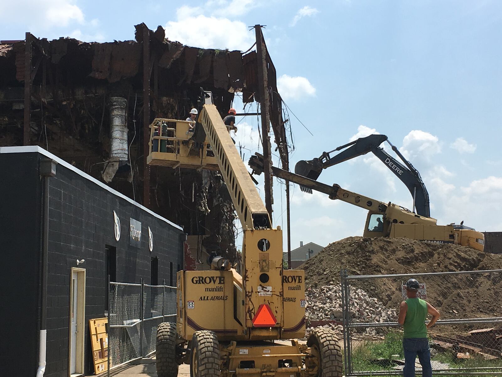 Bob Ryder, owner of Vicker’s Demolition, watches his crew demolish the former Studio Theater on Central Avenue. He said the demolition should be complete within one month. 