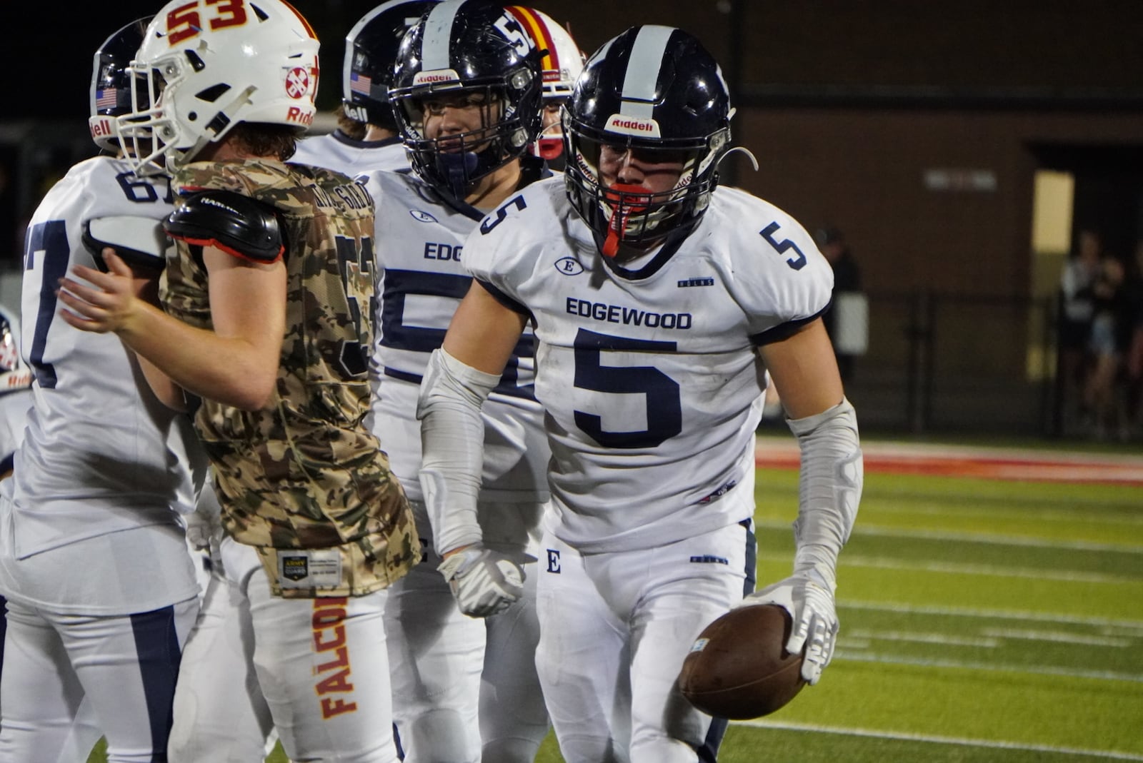 Edgewood running back Brody O’Banion (5) celebrates after a long run against Fenwick on Thursday night at Yeager Field. CHRIS VOGT / CONTRIBUTED