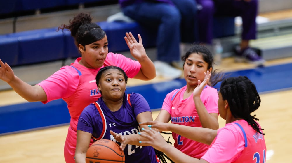 Middletown's Allie Daniels is defended by Hamilton team during their basketball game Friday, Jan. 23, 2026 at Hamilton High School. Hamilton won 47-38. NICK GRAHAM/STAFF