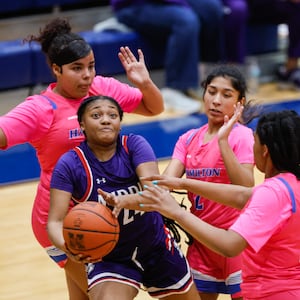 Middletown's Allie Daniels is defended by Hamilton team during their basketball game Friday, Jan. 23, 2026 at Hamilton High School. Hamilton won 47-38. NICK GRAHAM/STAFF