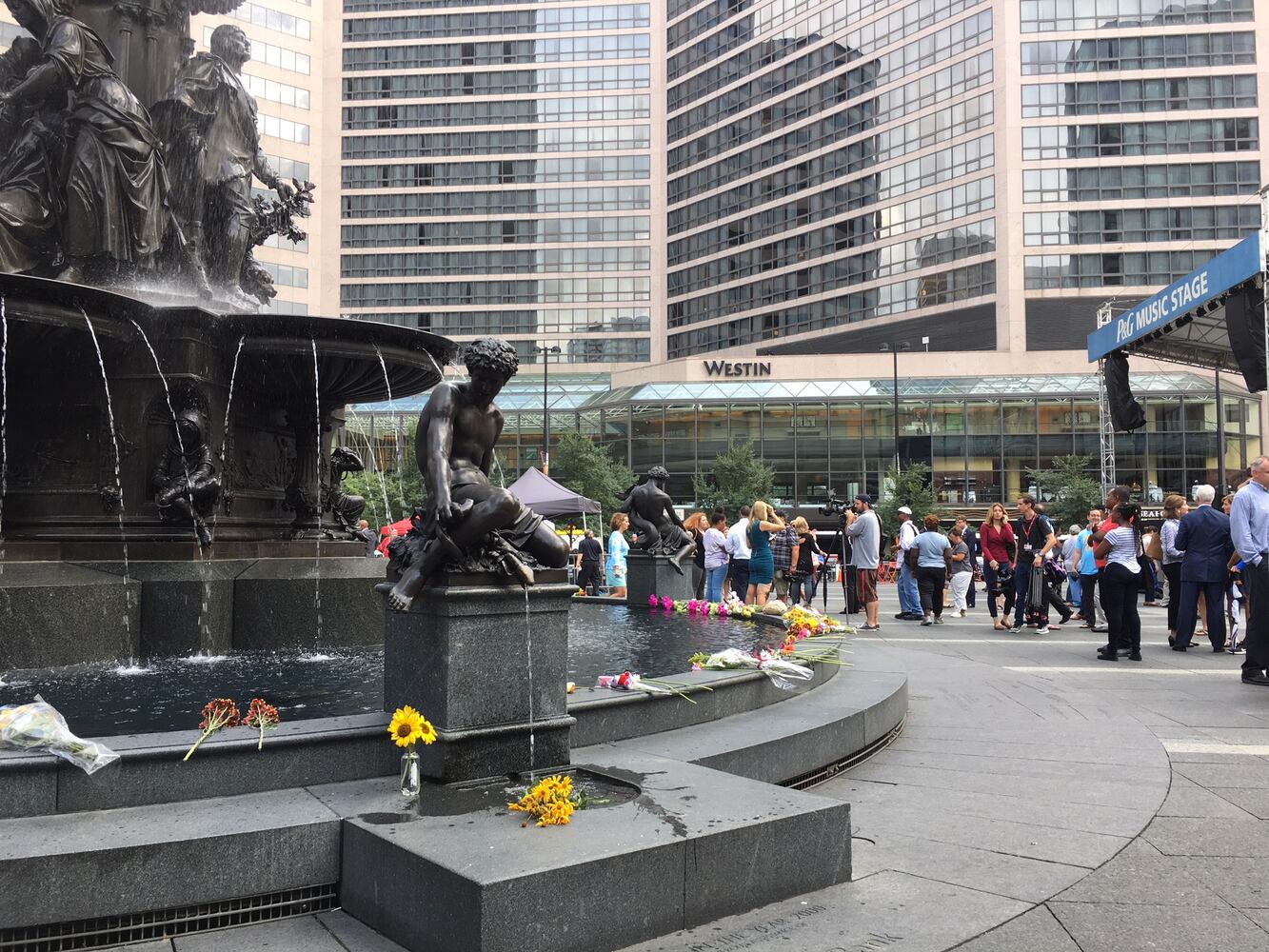Photos: Locals honor three killed day after Fountain Square shooting