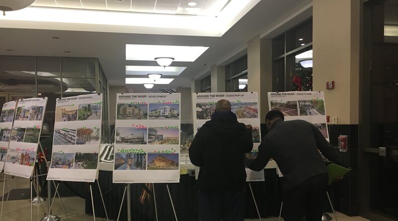 Hamilton residents gave their opinions Wednesday about ideas for the River District Master Plan, which will guide how the city develops along its riverfront. MIKE RUTLEDGE/STAFF
