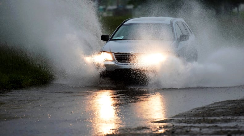 A car drives along Amanda Road in Middletown on Friday. NICK GRAHAM/STAFF