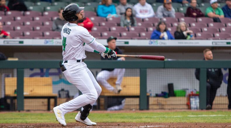 Dragons right fielder Rece Hinds watches his third home run of the season, a solo shot, clear the wall in right-center field in the second inning during the first game of Wednesday night's doubleheader. Jeff Gilbert/CONTRIBUTED