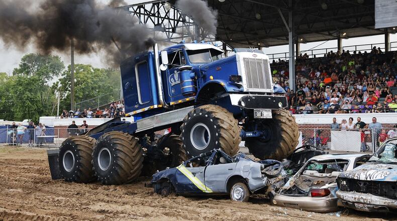 The Butler County Fair has three demolition derbies at the grandstand this year. There was a derby Monday and will be one today. This photo was taken at Wednesday's derby. NICK GRAHAM/STAFF